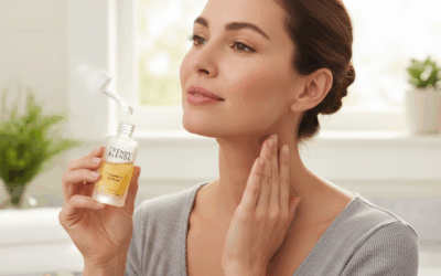7 Proven Ways to Find What Is the Best Face Serum for Sagging Neck Skin in 2025. 4 A woman applying Trendy Blends Vitamin C Serum to her neck using gentle, upward strokes. She is demonstrating the correct technique for massaging what is the best face serum for sagging neck skin to promote lifting and firmness.
