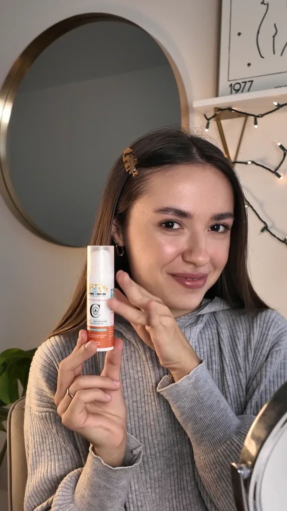 Trendy Blends 18% Pure Vitamin C Serum for face, shown in a vertical lifestyle view to highlight its clear, lightweight texture and pump bottle packaging.